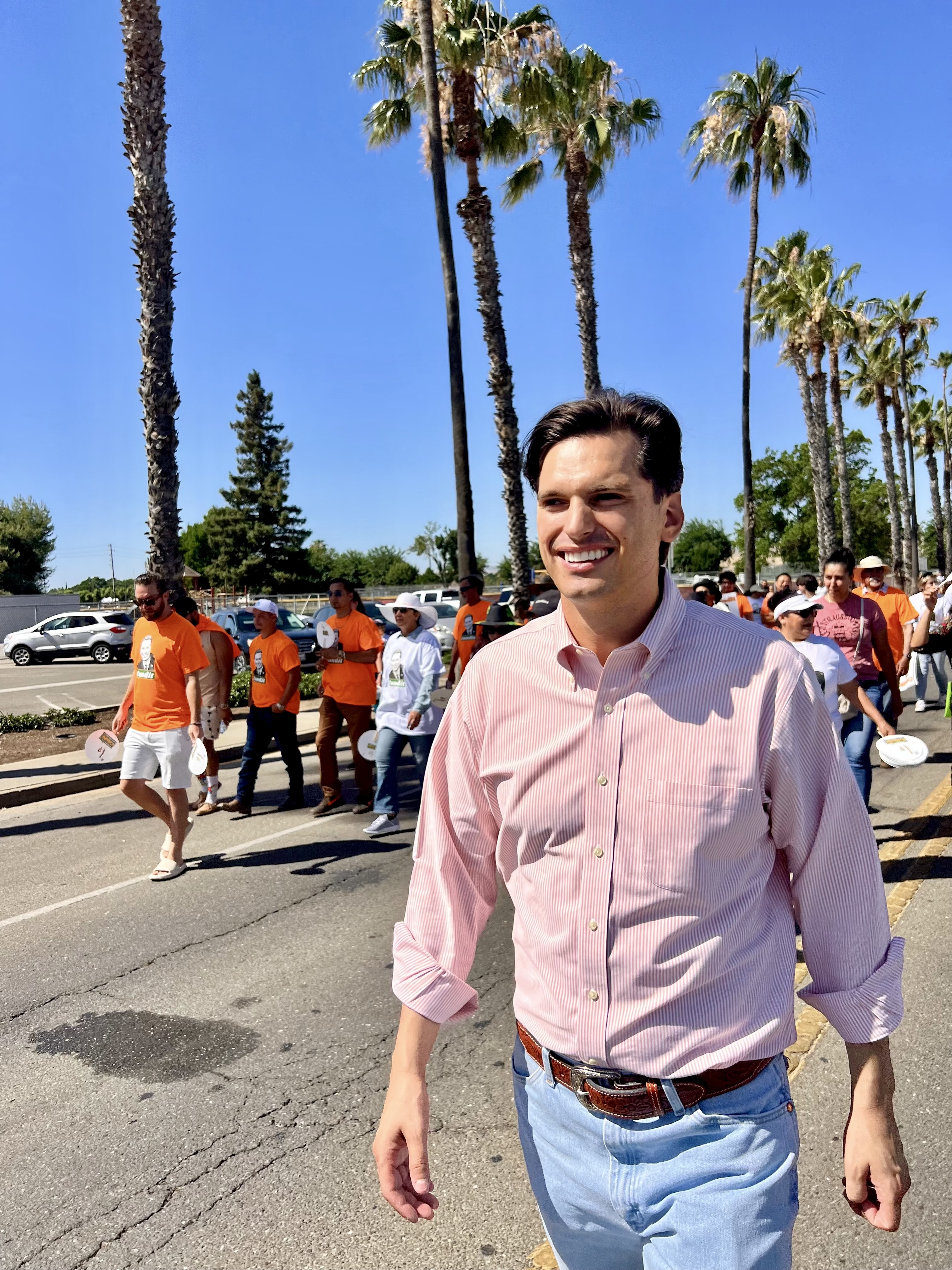 Channce Condit walking in the Patterson Apricot Fiesta Parade